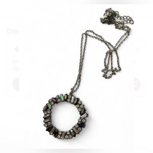 Pendant necklace with ab and oil slick rhinestones